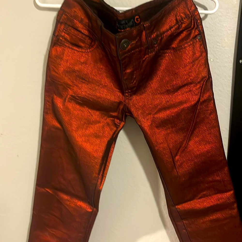 Used. red guess woman’s jeans.